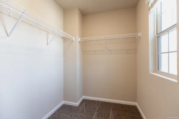 a view of small space with racks on the wall