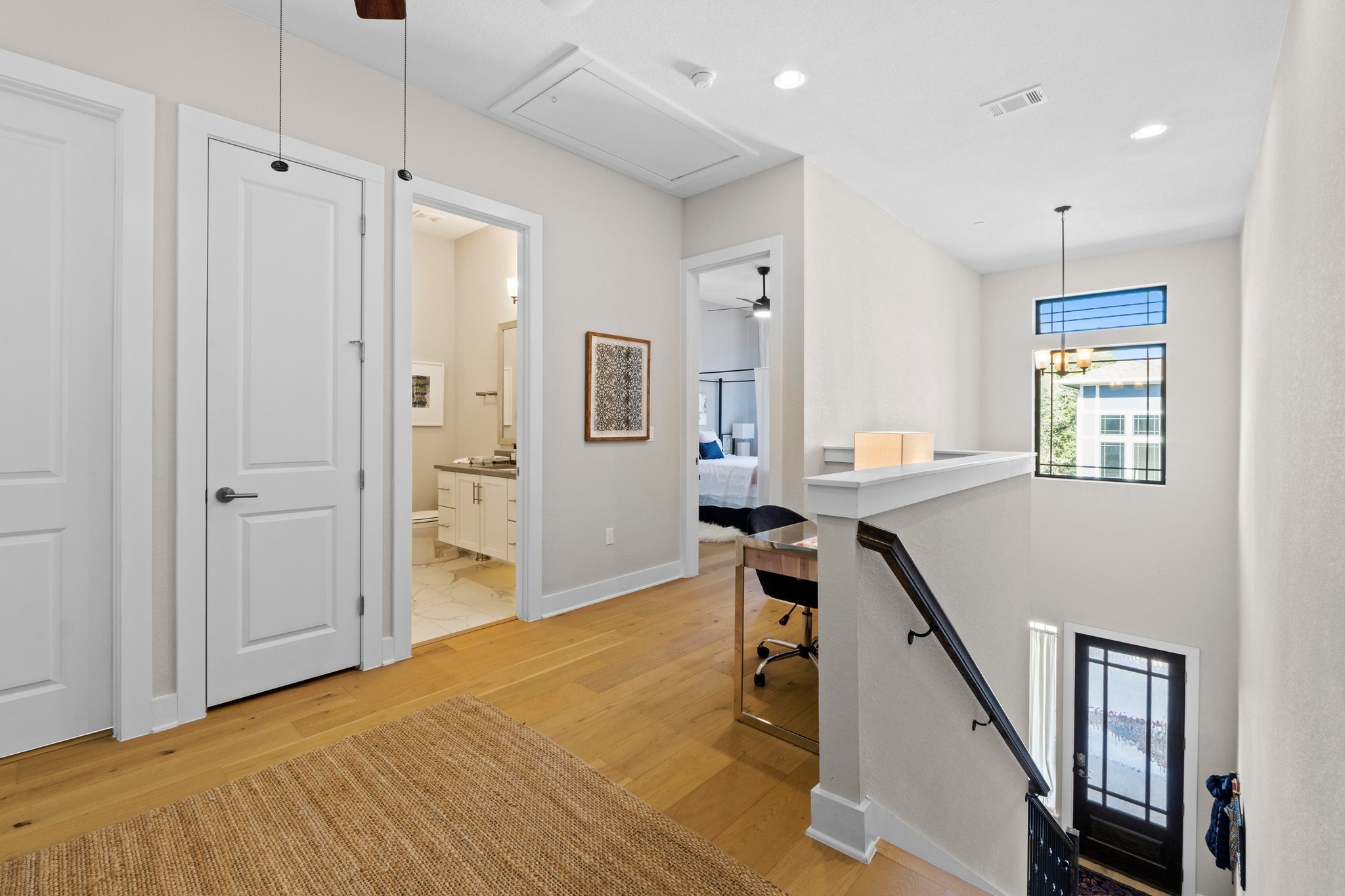 4323 Spicewood Springs Road, Unit 6 Austin, TX 78759 - Photo 19 of 40 Hall featuring an upstairs landing, attic access, a chandelier, recessed lighting, and light wood finished floors