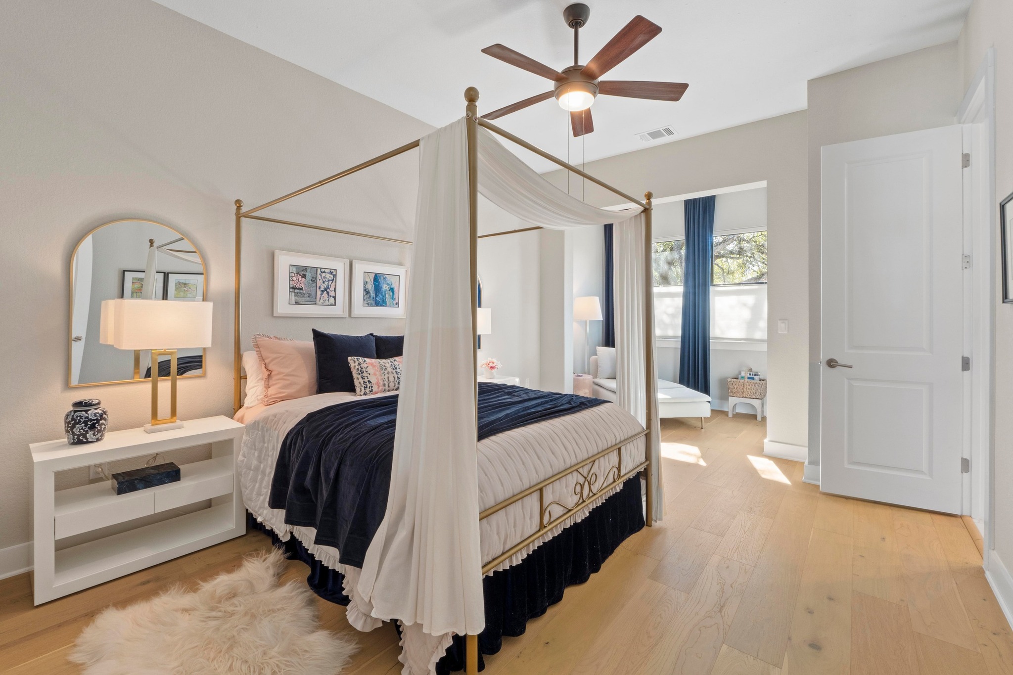 4323 Spicewood Springs Road, Unit 6 Austin, TX 78759 - Photo 23 of 40 Bedroom featuring light wood-type flooring and ceiling fan