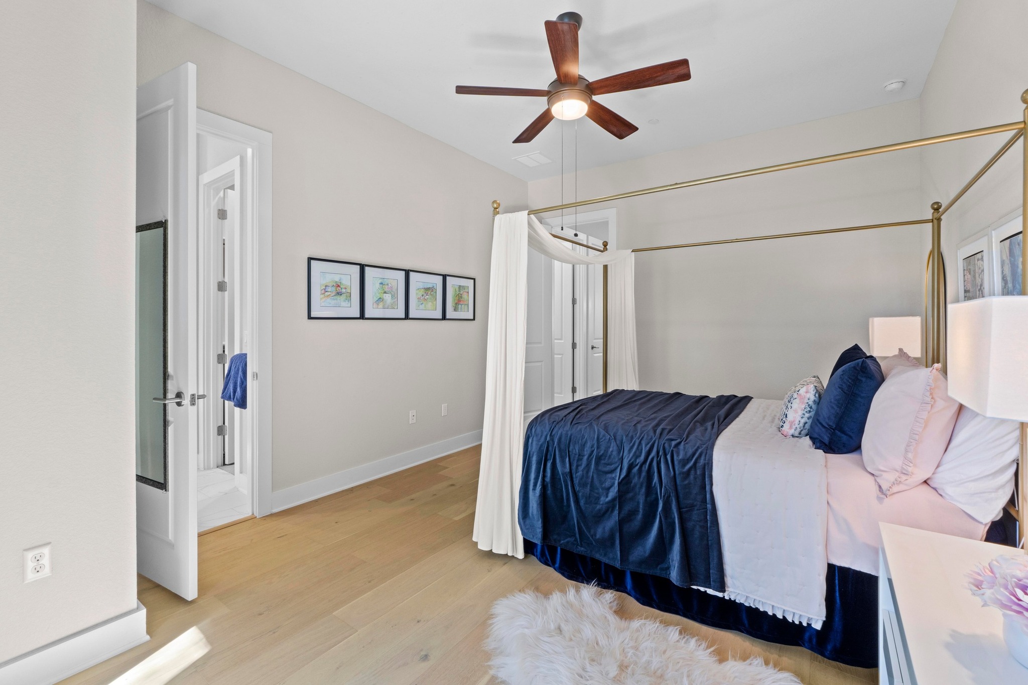 4323 Spicewood Springs Road, Unit 6 Austin, TX 78759 - Photo 26 of 40 Bedroom featuring wood finished floors and ceiling fan