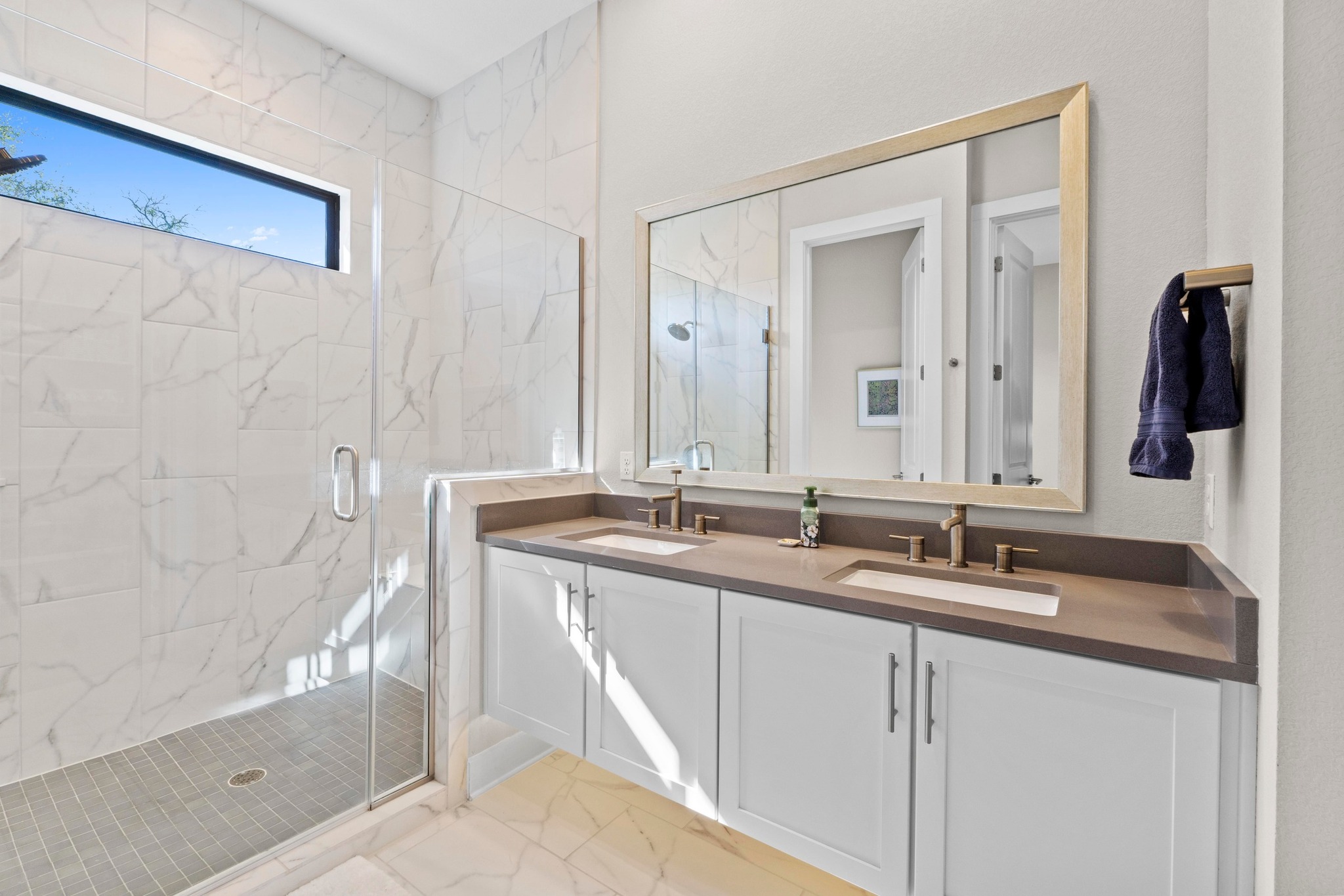 4323 Spicewood Springs Road, Unit 6 Austin, TX 78759 - Photo 28 of 40 Primary bath with light marble finish flooring, double vanity, and a marble finish shower