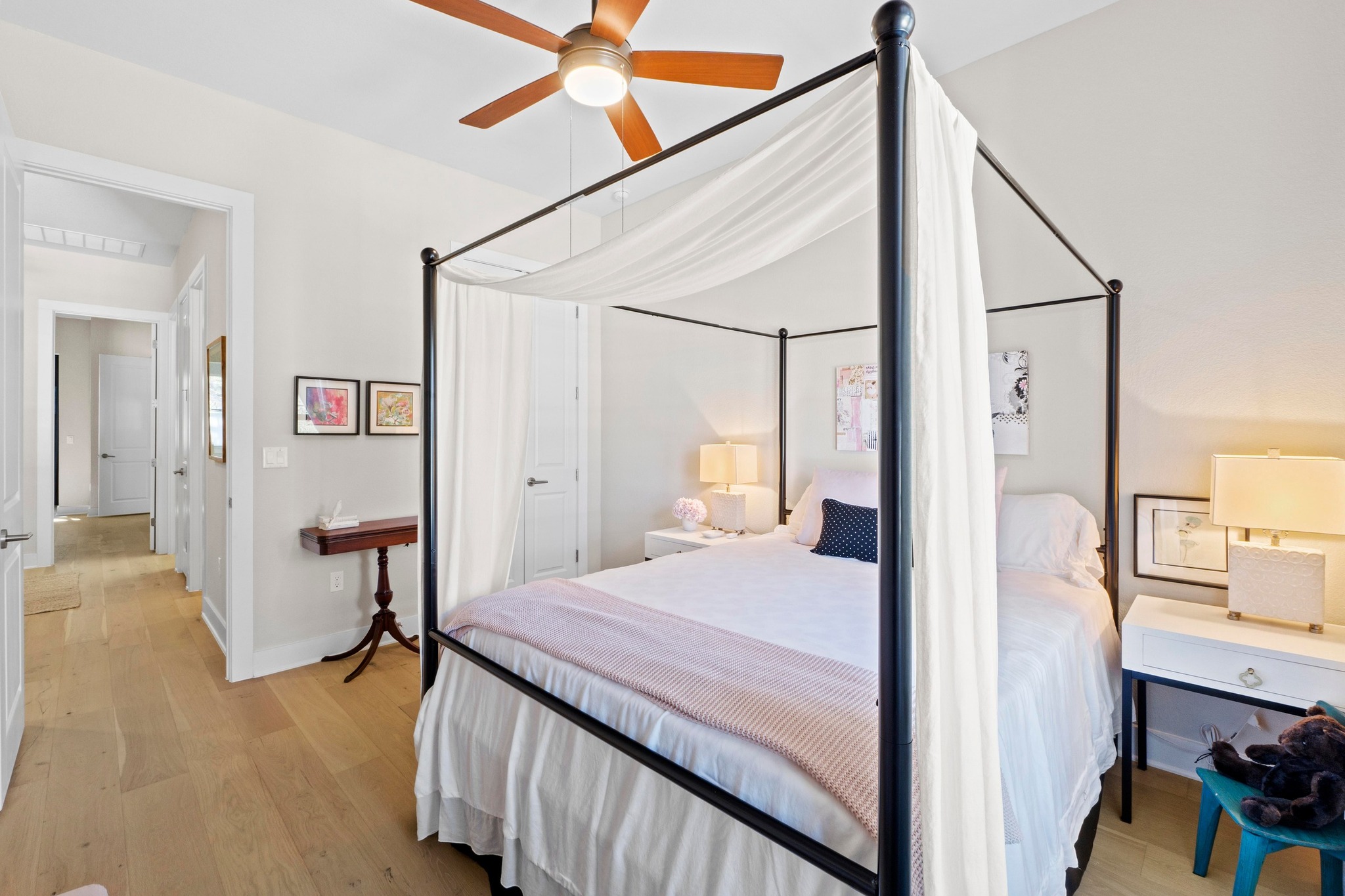 4323 Spicewood Springs Road, Unit 6 Austin, TX 78759 - Photo 33 of 40 Bedroom with light wood-type flooring and a ceiling fan