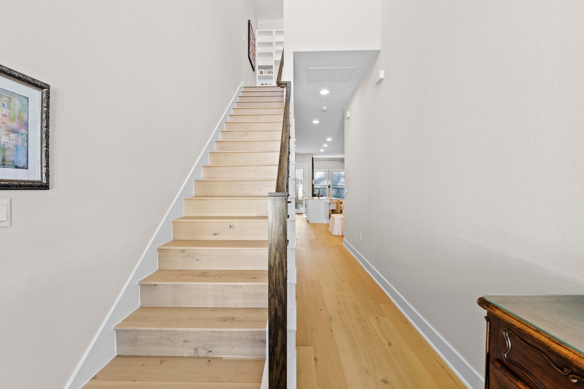 4323 Spicewood Springs Road, Unit 6 Austin, TX 78759 - Photo 5 of 40 Stairway featuring hardwood / wood-style floors, a towering ceiling, and recessed lighting