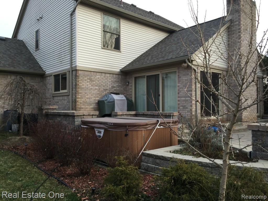 1600 Dunston Road Canton, MI 48188 - Photo 29 of 39 Patio Features Jacuzzi/Hot Tub.