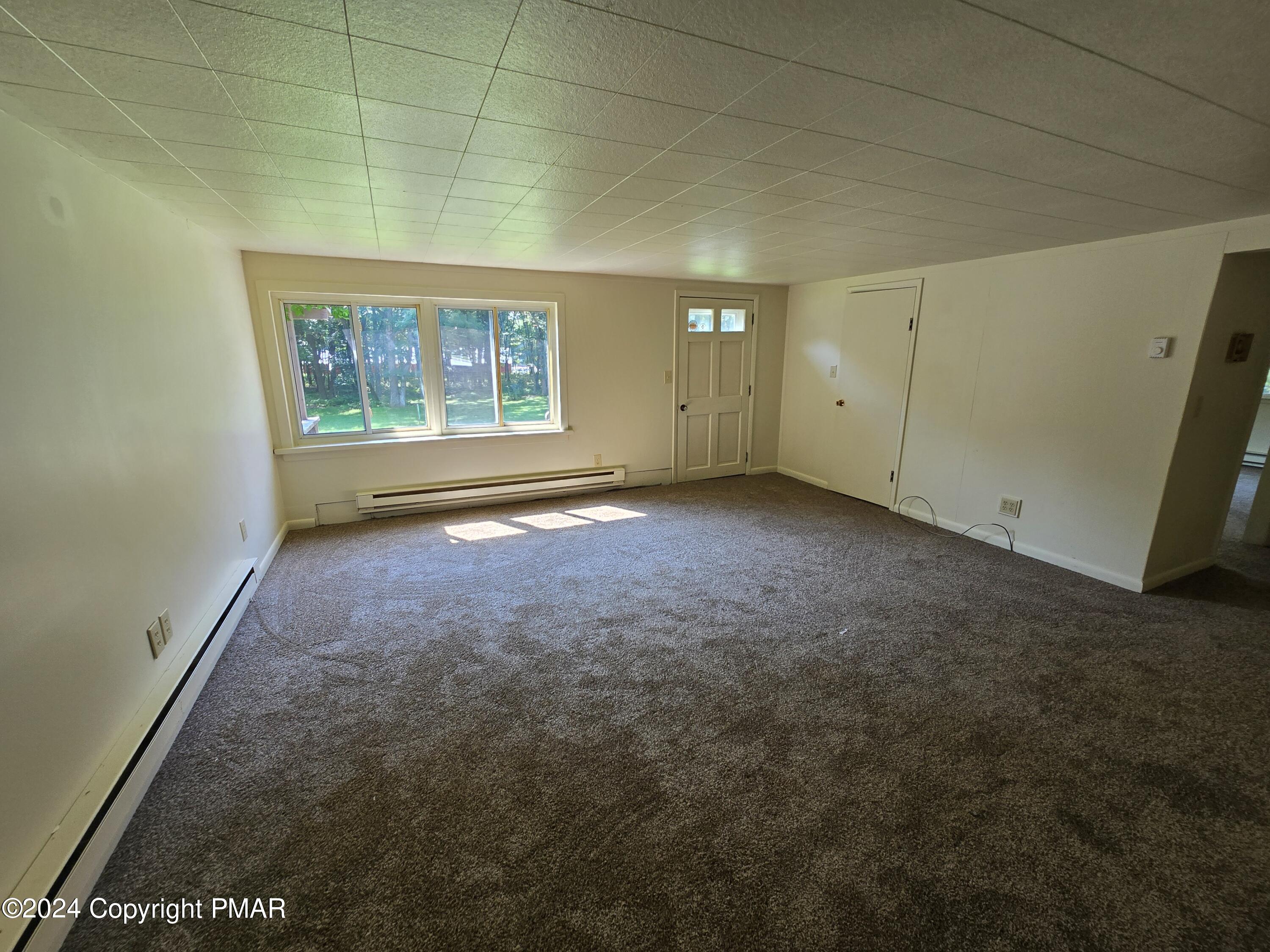 119 Maggie Way Effort, PA 18330 - Photo 4 of 7 a view of an empty room with a window