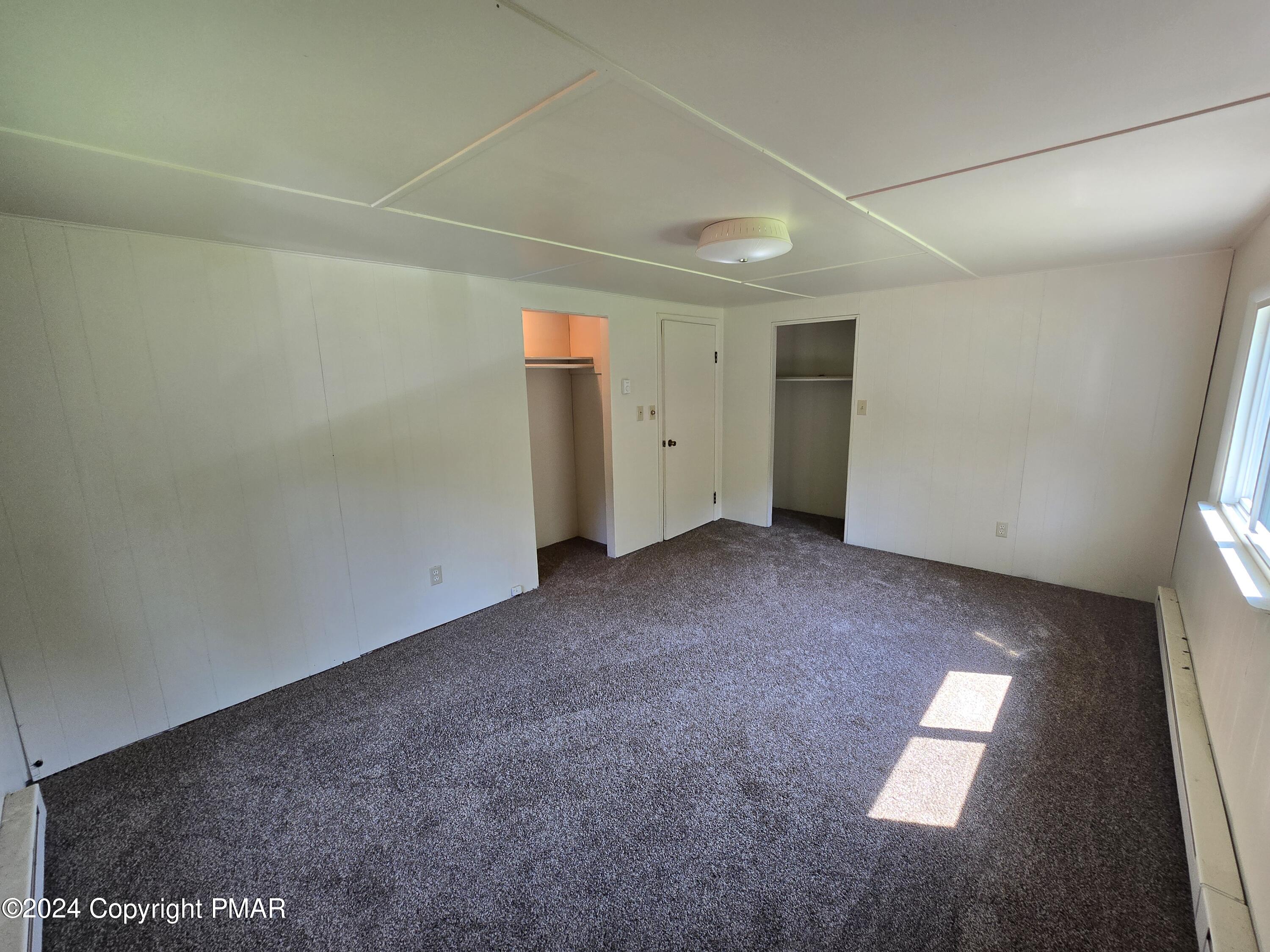 119 Maggie Way Effort, PA 18330 - Photo 6 of 7 an empty room with windows