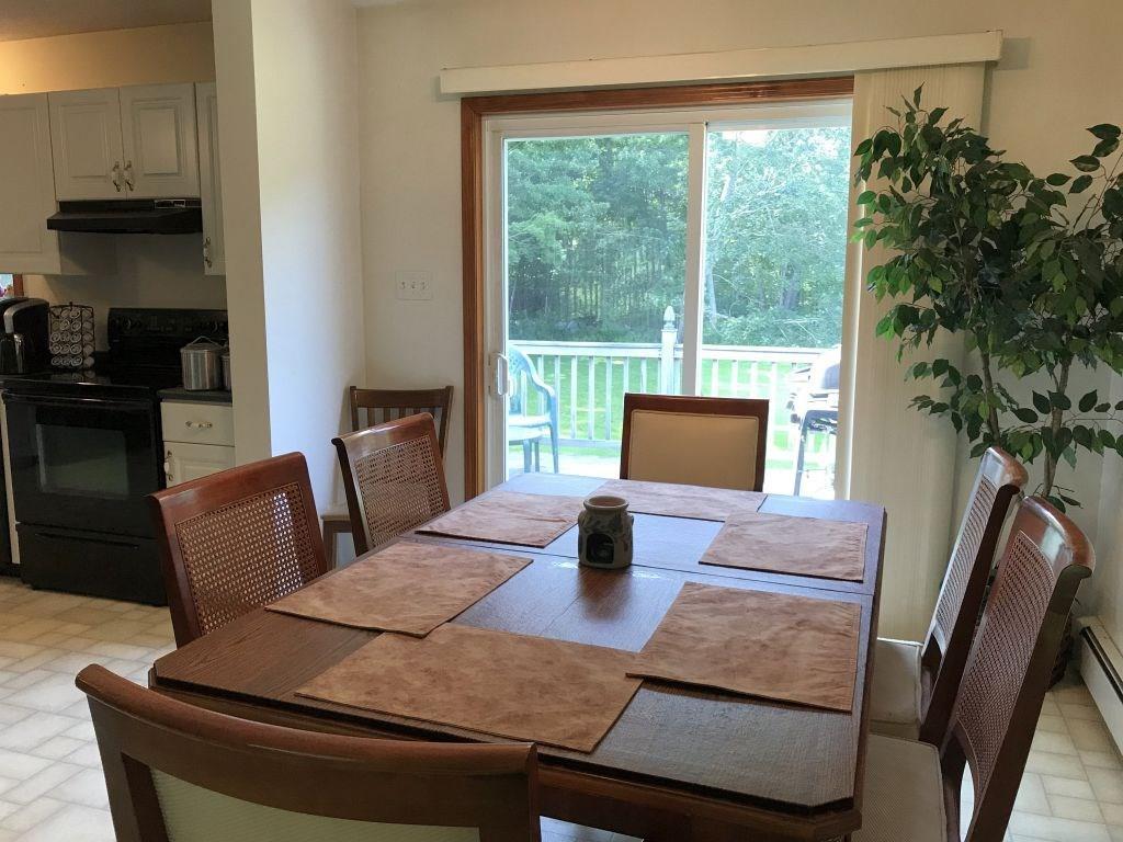113 Beech Ridge Road York, ME 03909 - Photo 3 of 22 Dining room with slider to large...