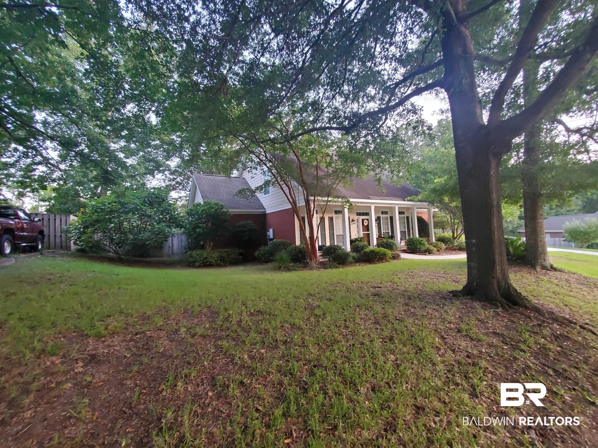 31163 Woodland Way Daphne, AL 36527 - Photo 5 of 44 Exterior space with a front yard
