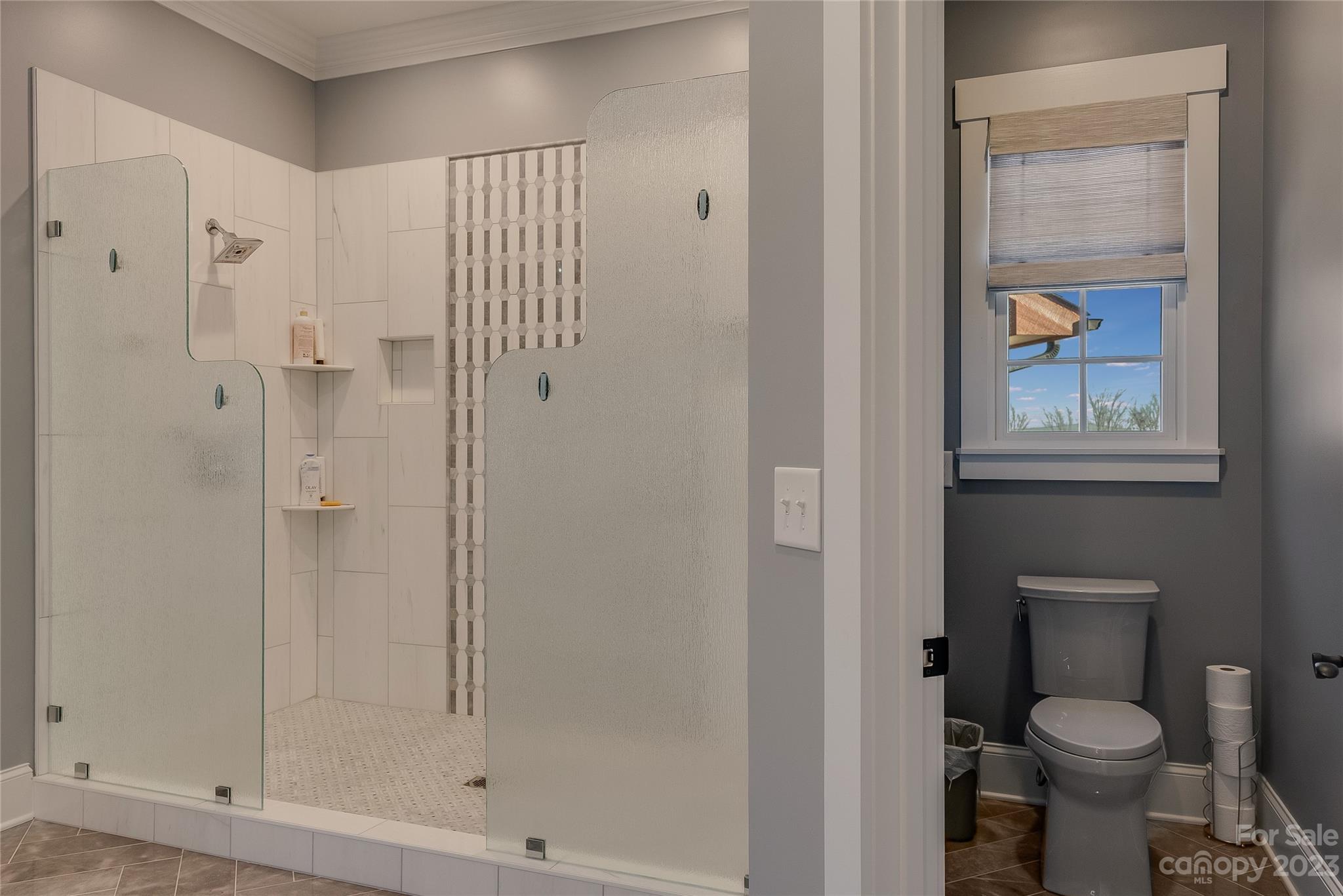 1416 Barbee Road Shelby, NC 28150 - Photo 11 of 41 a bathroom with a toilet and a shower