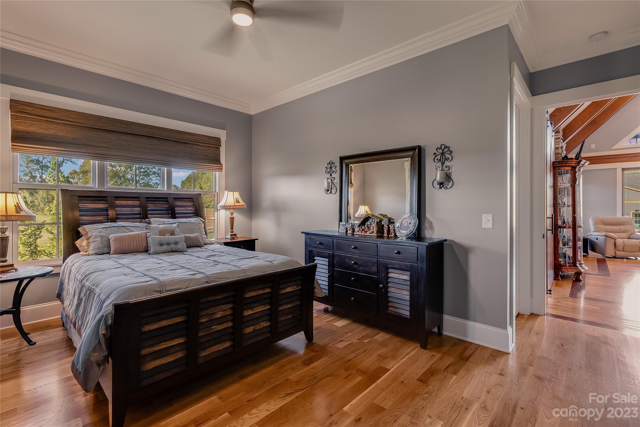 1416 Barbee Road Shelby, NC 28150 - Photo 14 of 41 a bedroom with a bed and wooden floor