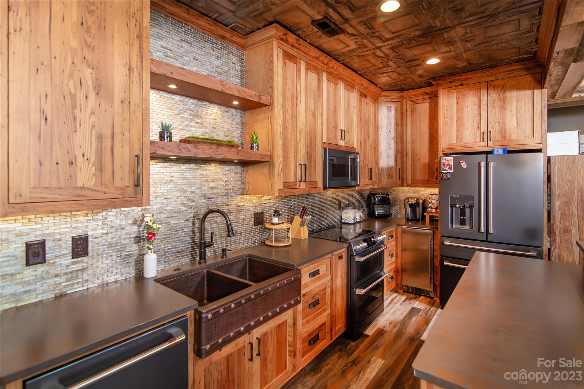 1416 Barbee Road Shelby, NC 28150 - Photo 25 of 41 a kitchen with stainless steel appliances a sink a stove and a refrigerator
