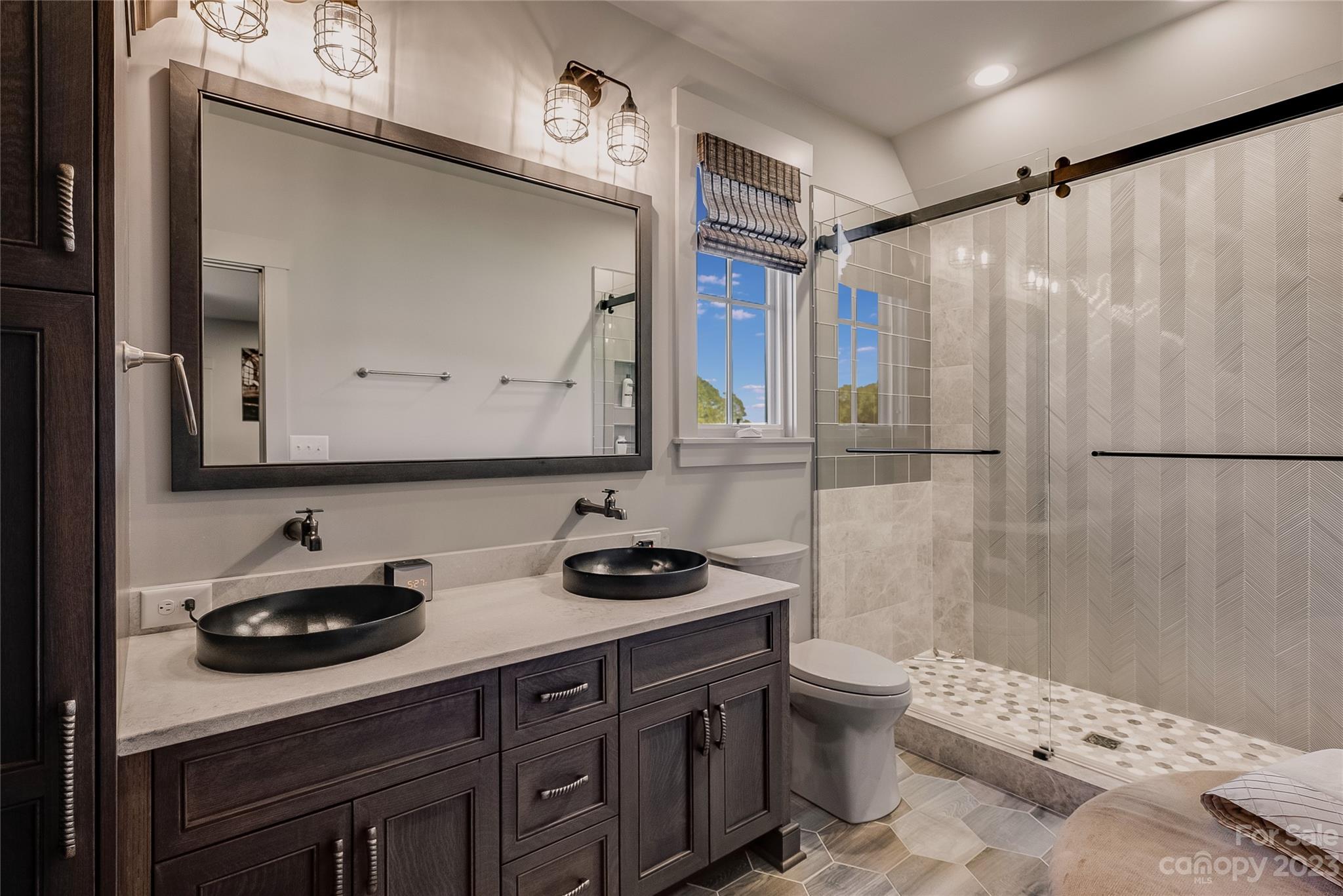 1416 Barbee Road Shelby, NC 28150 - Photo 28 of 41 a bathroom with a sink a toilet and shower