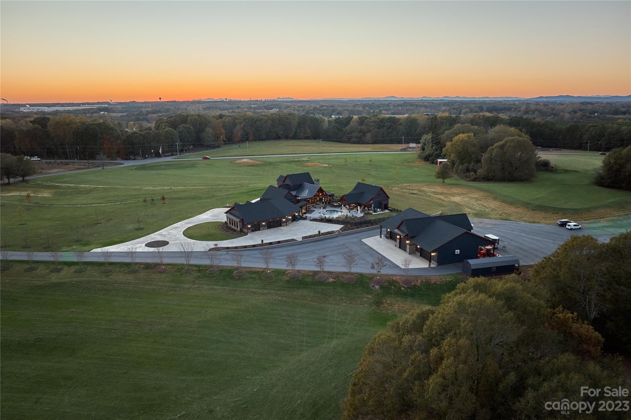 1416 Barbee Road Shelby, NC 28150 - Photo 3 of 41 a view of a lake with a yard