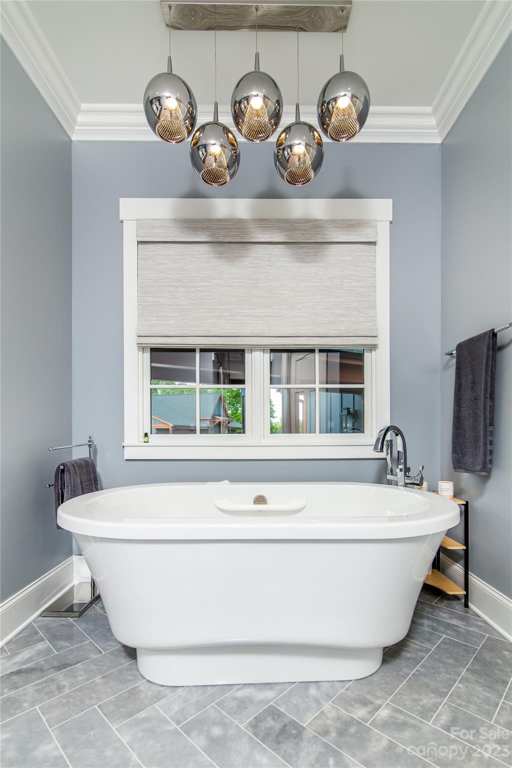 1416 Barbee Road Shelby, NC 28150 - Photo 10 of 41 a white bath tub sitting in a bathroom