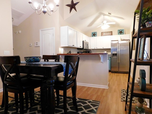 105 Benton Road Juliette, GA 31046 - Photo 2 of 19 a kitchen with stainless steel appliances granite countertop a sink stove and refrigerator