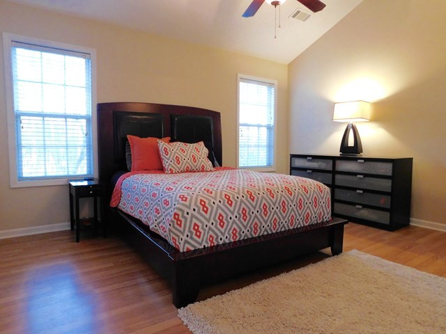 105 Benton Road Juliette, GA 31046 - Photo 6 of 19 a bedroom with a bed lamps and window