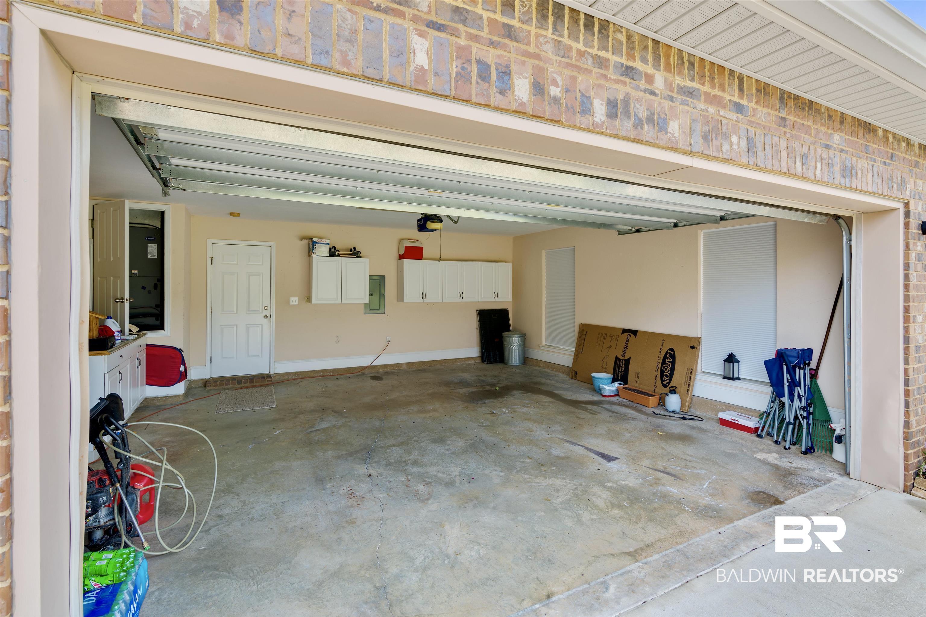11083 Roanoke Loop Daphne, AL 36526 - Photo 13 of 38 Storage in garage