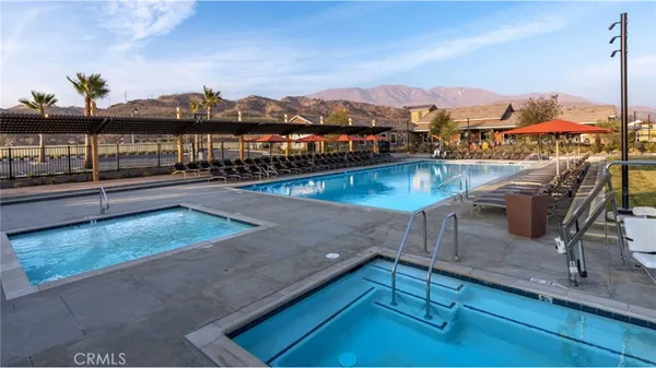 a view of a swimming pool with a mountain