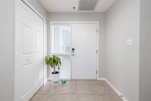 a view of a closet area with an empty room
