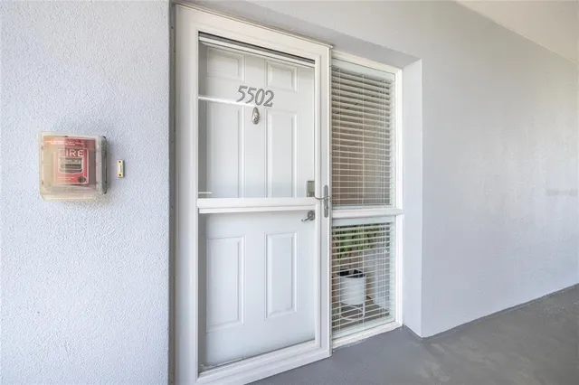 a view of a room that has a window