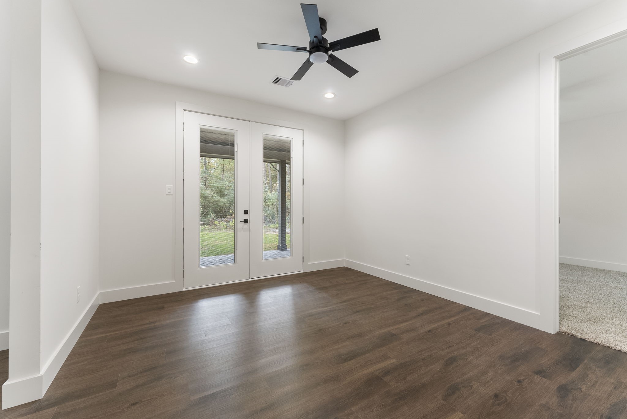 29001 Colin Court Waller, TX 77484 - Photo 26 of 47 This flex space is off the three bedrooms and leads to a 2nd patio. Perfect for office space, game room, gym, etc