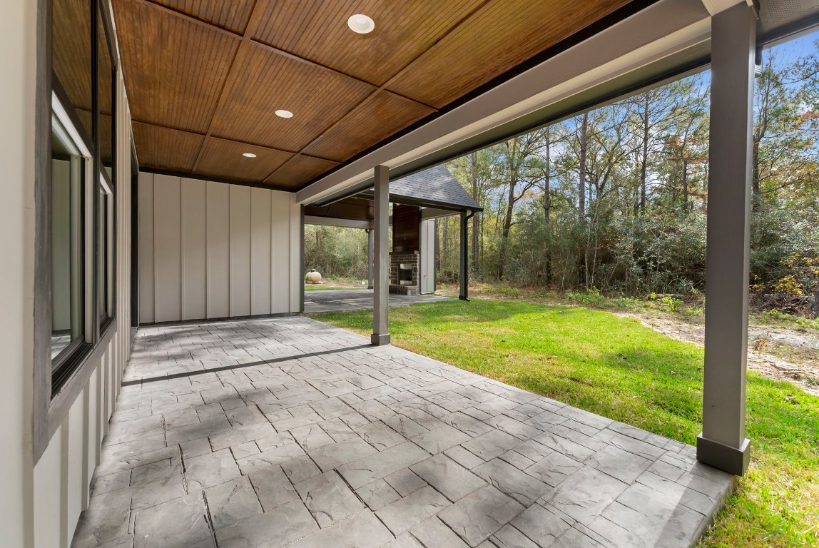 29001 Colin Court Waller, TX 77484 - Photo 37 of 47 a view of a porch with a backyard