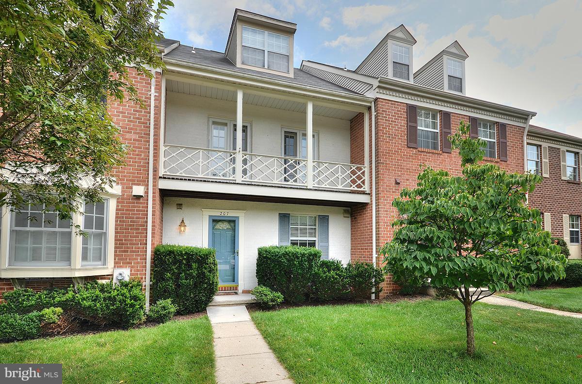 207 Castletown Road Lutherville-Timonium, MD 21093 - Photo 1 of 21 a front view of a house with a yard