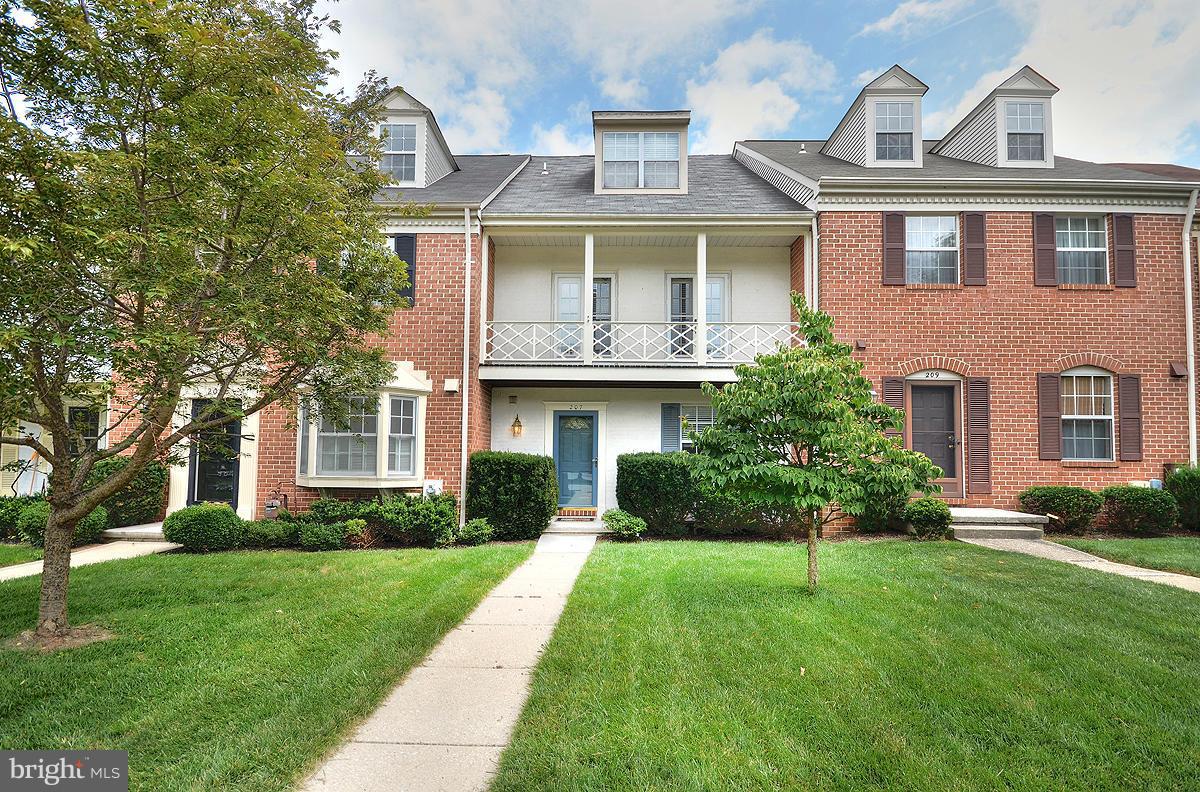 207 Castletown Road Lutherville-Timonium, MD 21093 - Photo 2 of 21 front view of a house with a yard
