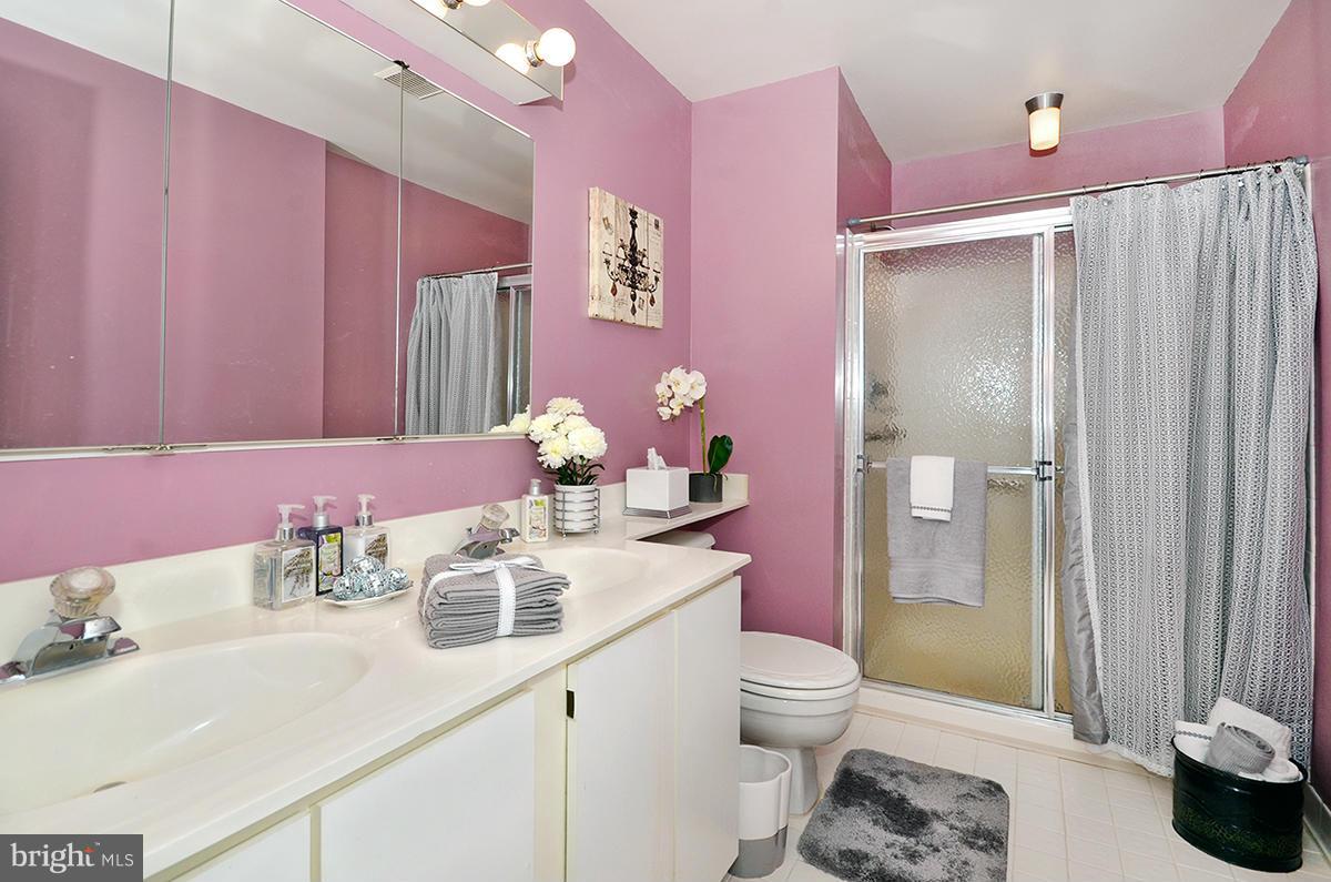 207 Castletown Road Lutherville-Timonium, MD 21093 - Photo 13 of 21 a bathroom with a sink vanity granite and toilet