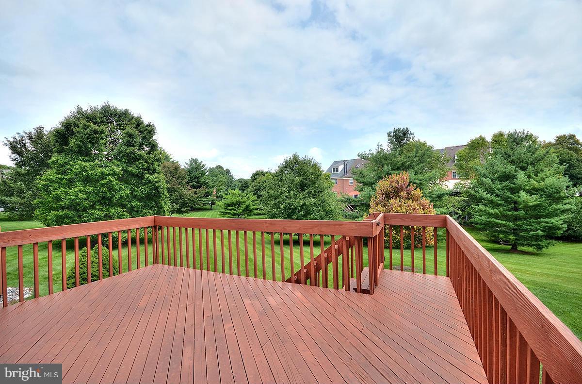 207 Castletown Road Lutherville-Timonium, MD 21093 - Photo 17 of 21 a balcony with wooden floor and fence