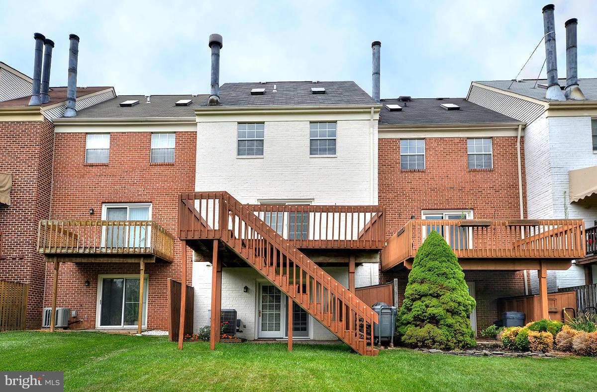 207 Castletown Road Lutherville-Timonium, MD 21093 - Photo 20 of 21 a front view of a house with a yard