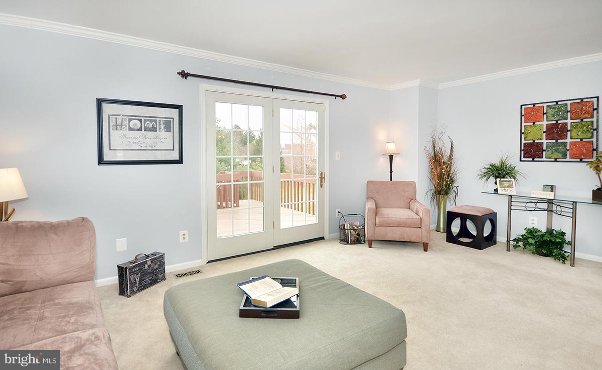 207 Castletown Road Lutherville-Timonium, MD 21093 - Photo 3 of 21 a living room with furniture and a fireplace