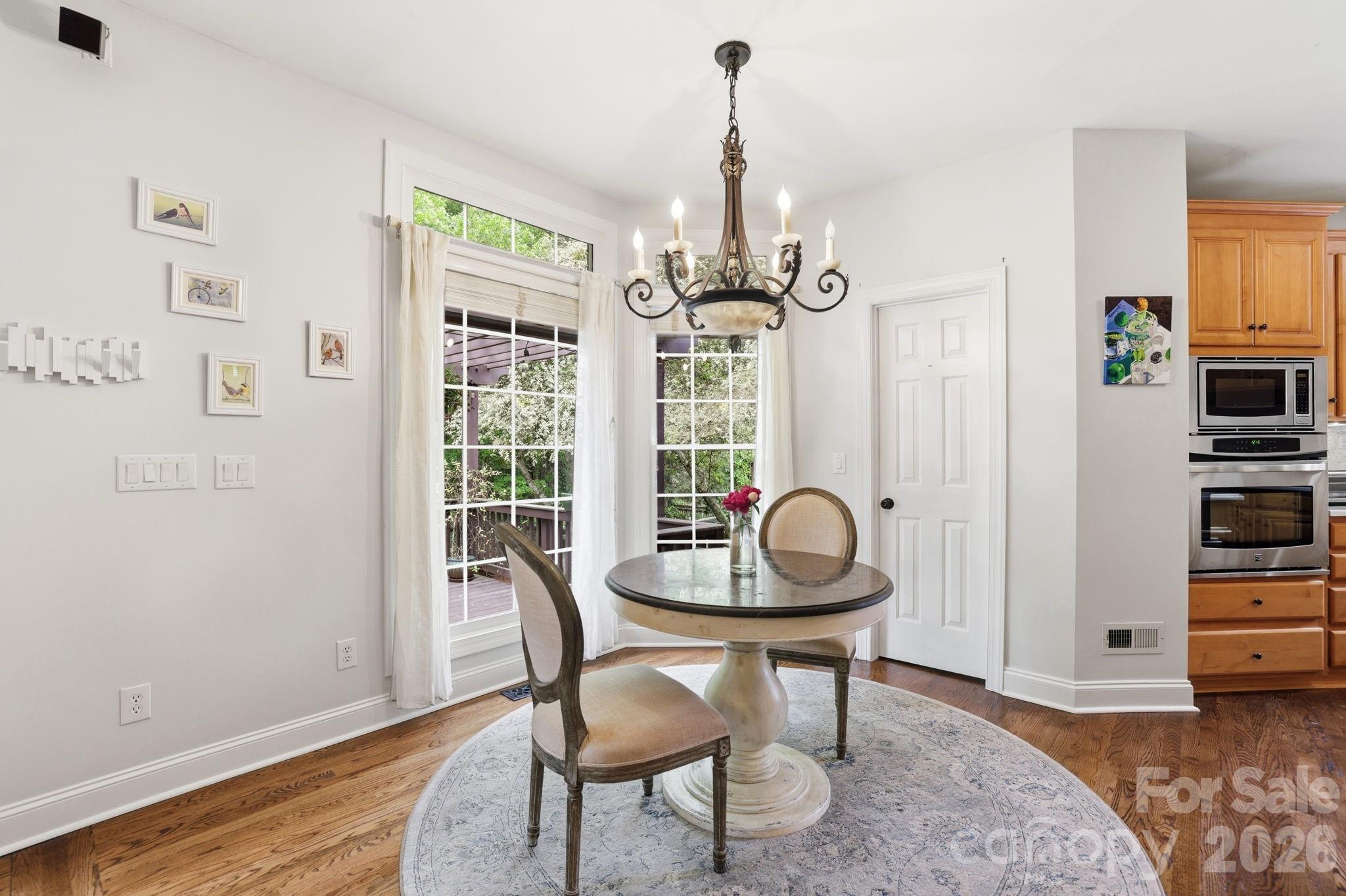 239 Sardis Pointe Road Matthews, NC 28105 - Photo 15 of 47 a dining room with furniture and window