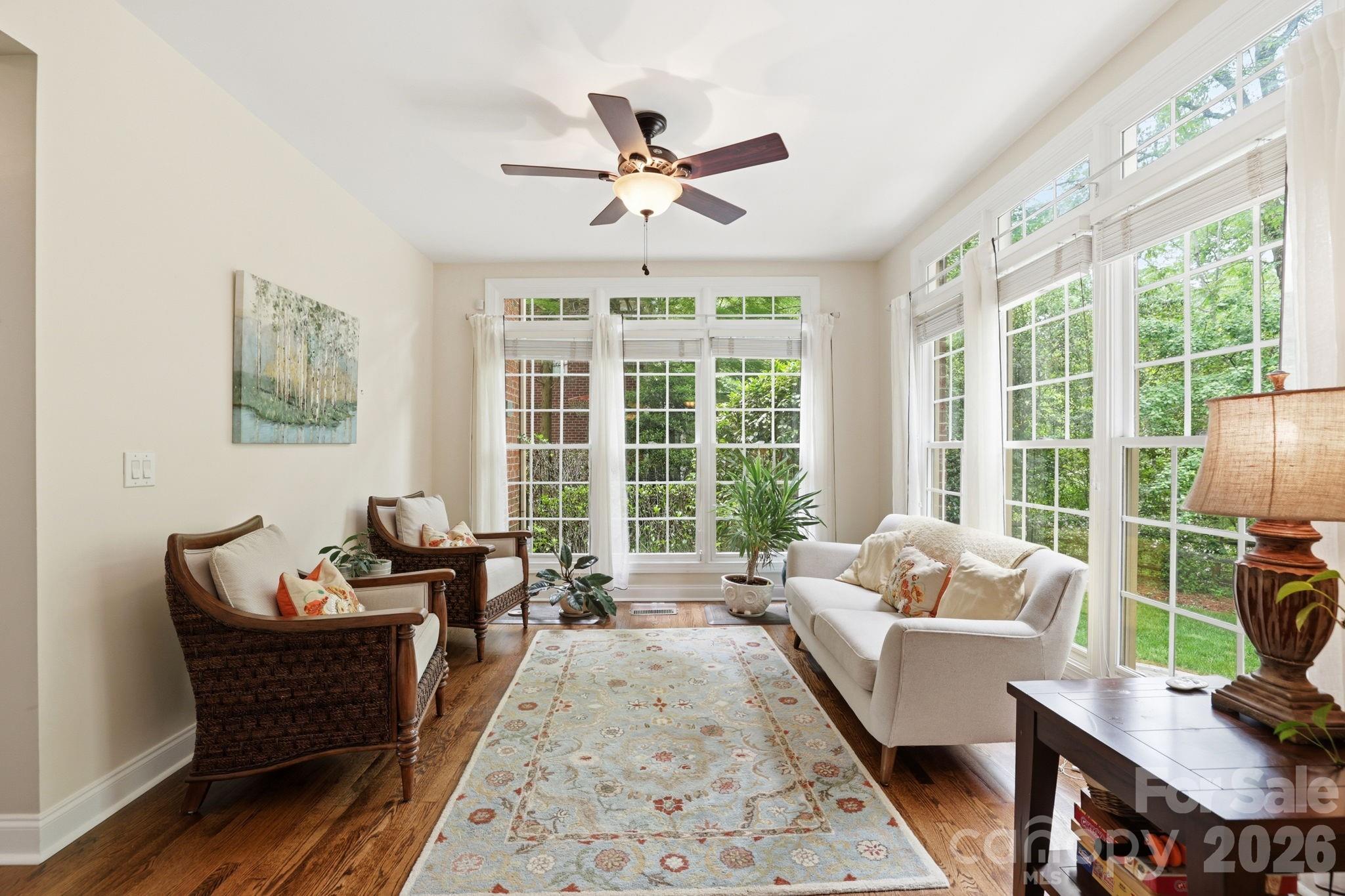 239 Sardis Pointe Road Matthews, NC 28105 - Photo 20 of 47 a living room with furniture and a large window