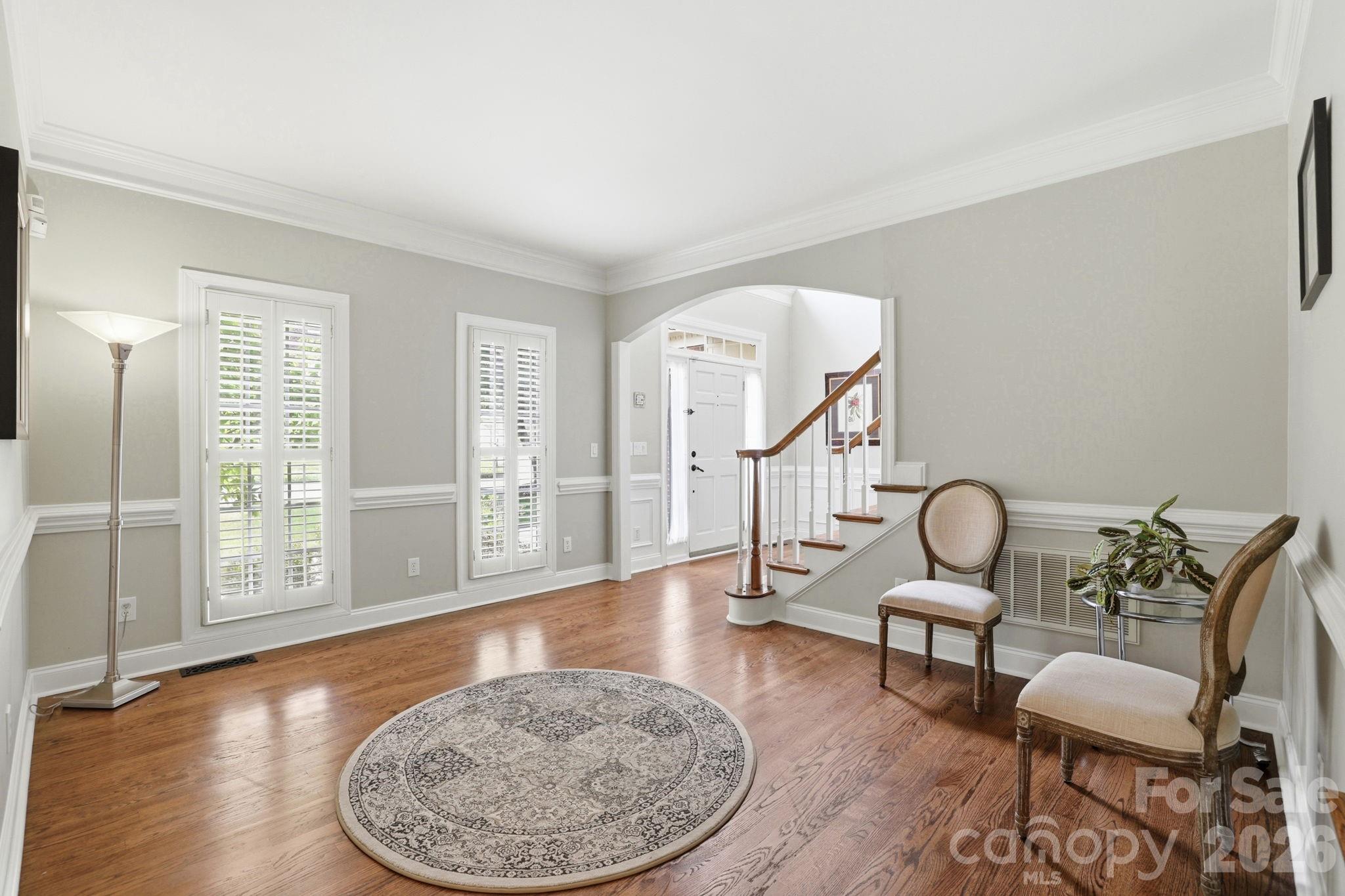 239 Sardis Pointe Road Matthews, NC 28105 - Photo 6 of 47 a view of a livingroom with furniture and hardwood floor