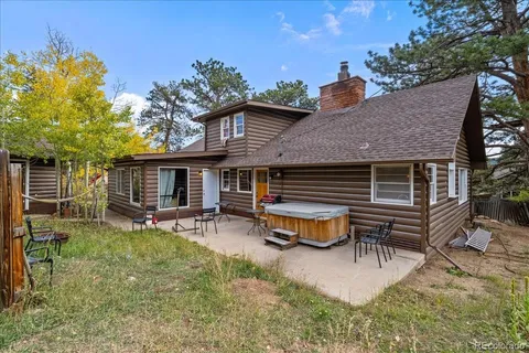 a backyard of a house with seating space