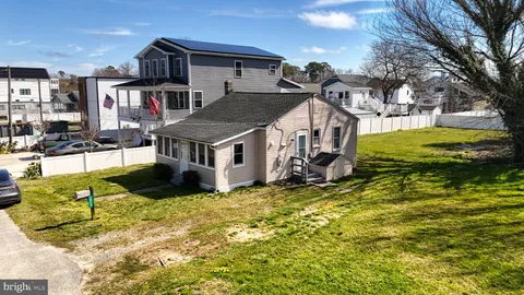 a view of a house with a big yard