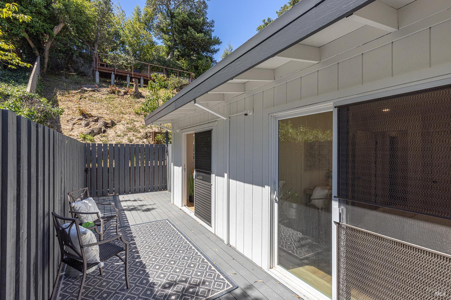 157 Homestead Boulevard Mill Valley, CA 94941 - Photo 15 of 20 a view of a house with a bench in patio