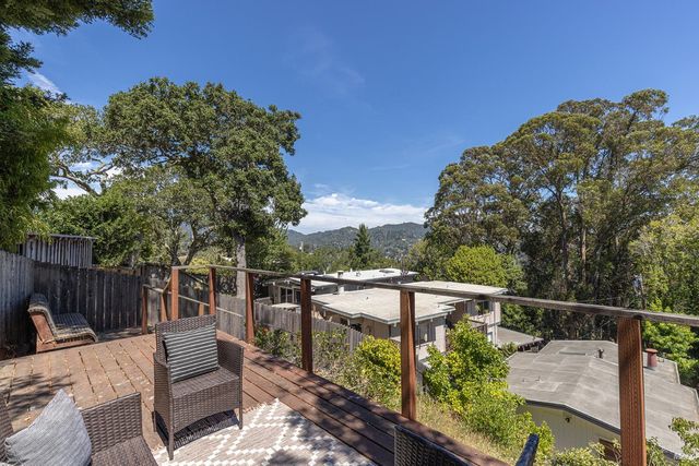 a view of a roof deck with couches