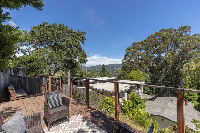 a view of a roof deck with couches