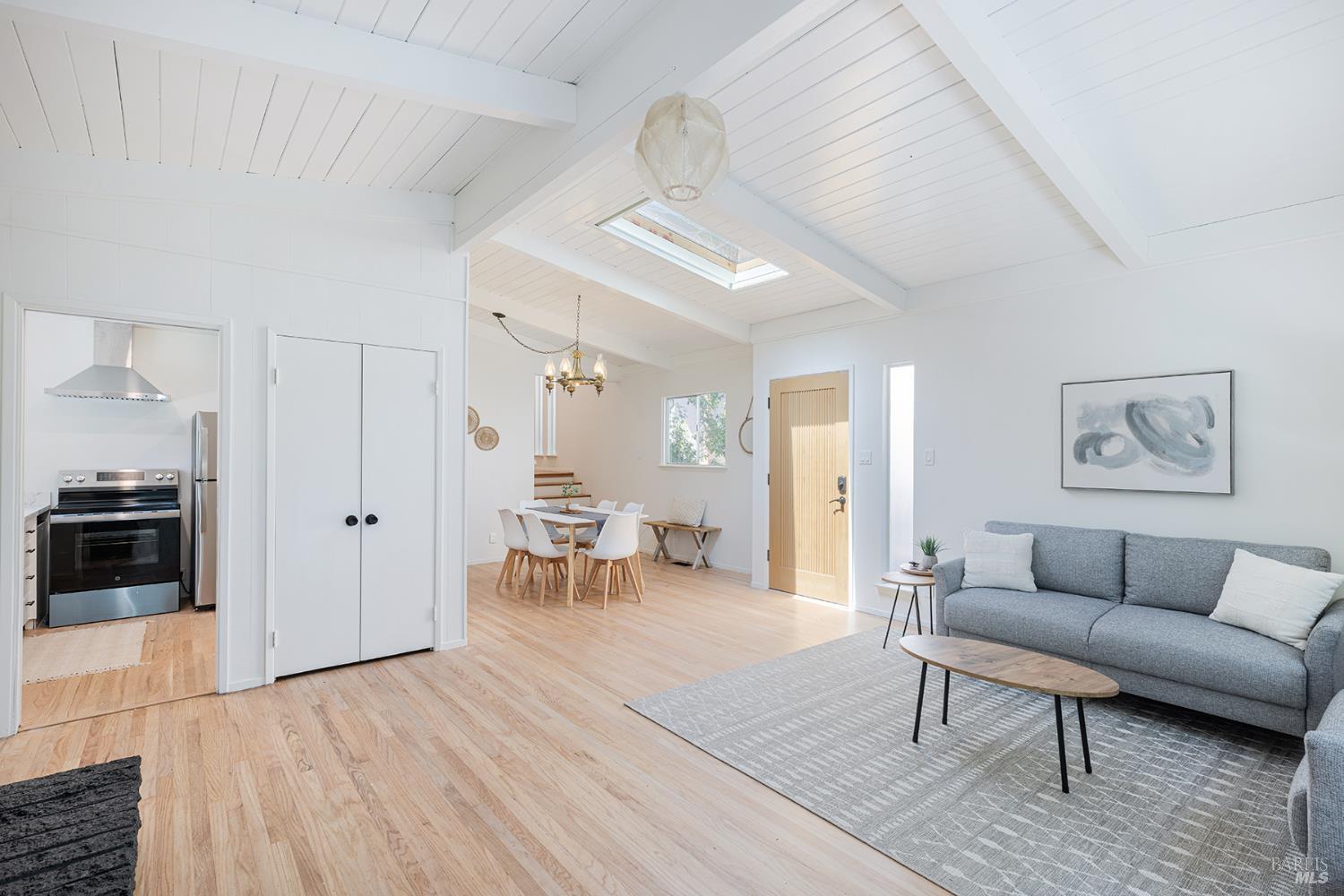 157 Homestead Boulevard Mill Valley, CA 94941 - Photo 4 of 20 a living room with furniture and wooden floor