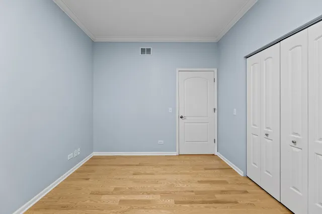 a bathroom with a granite countertop sink toilet a mirror and shower