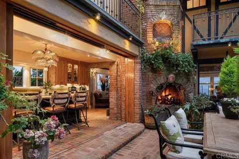 a view of a chairs and tables in the patio