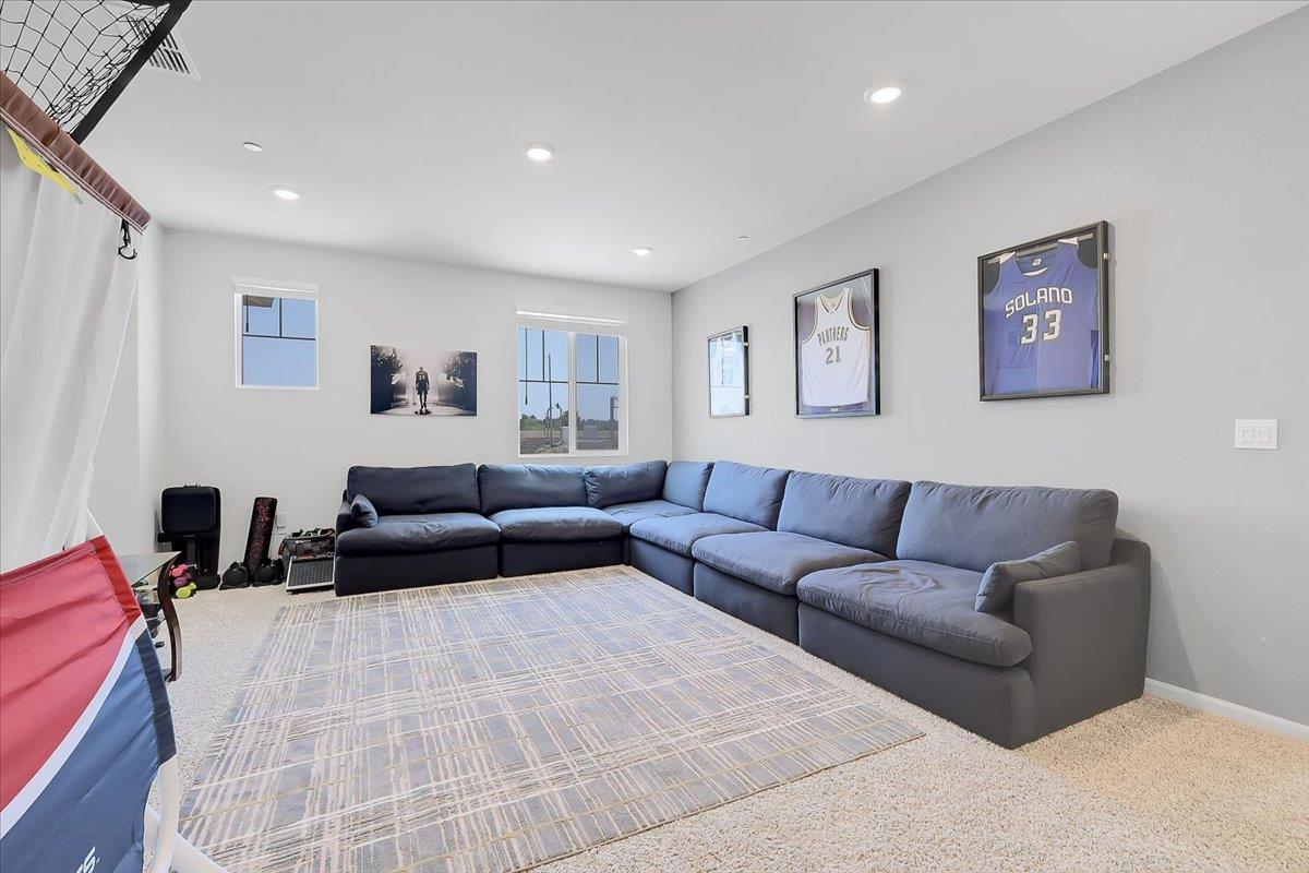 794 Berryessa Way Olivehurst, CA 95961 - Photo 20 of 40 a living room with furniture and a couch