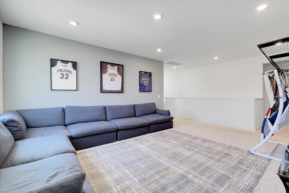 794 Berryessa Way Olivehurst, CA 95961 - Photo 21 of 40 a living room with furniture and a couch