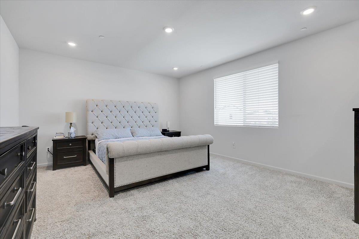 794 Berryessa Way Olivehurst, CA 95961 - Photo 28 of 40 a living room with furniture and a flat screen tv