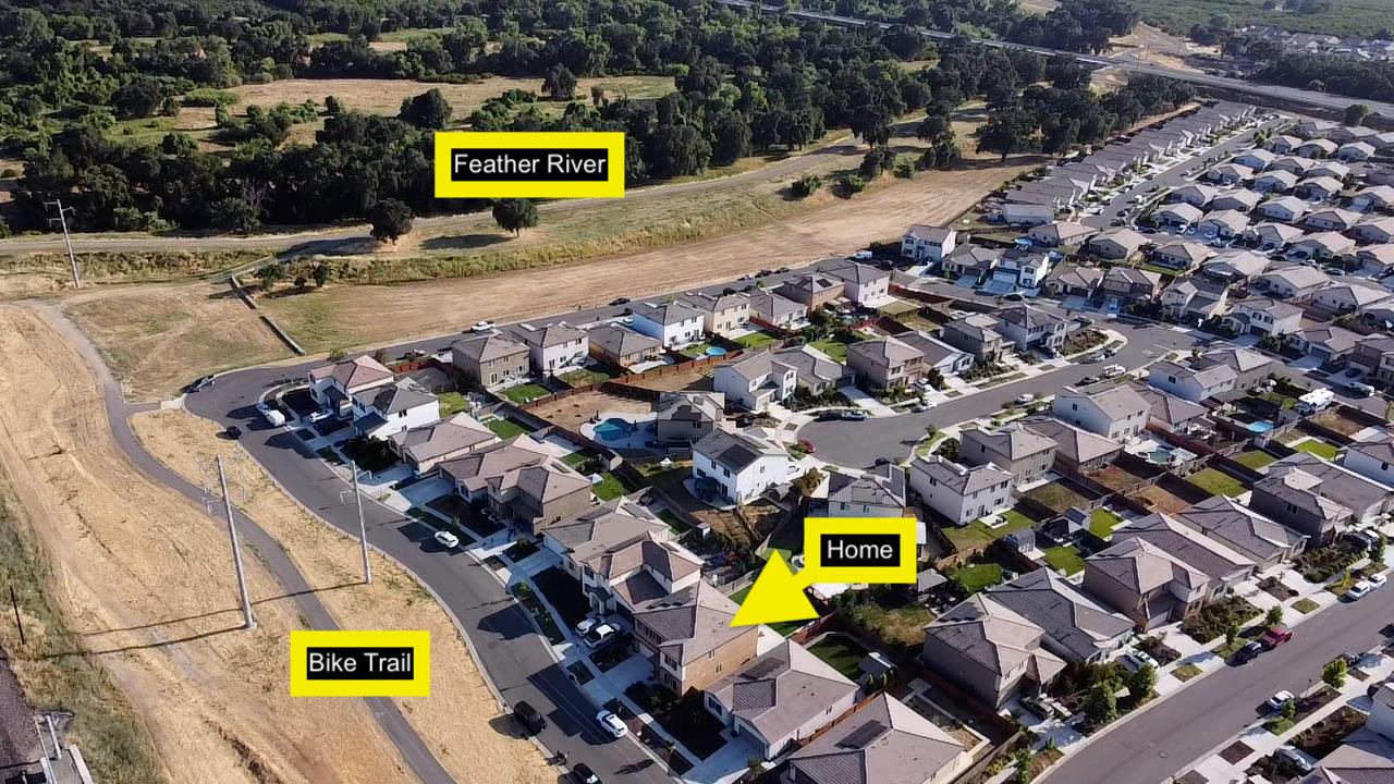 794 Berryessa Way Olivehurst, CA 95961 - Photo 40 of 40 an aerial view of a swimming pool with outdoor seating
