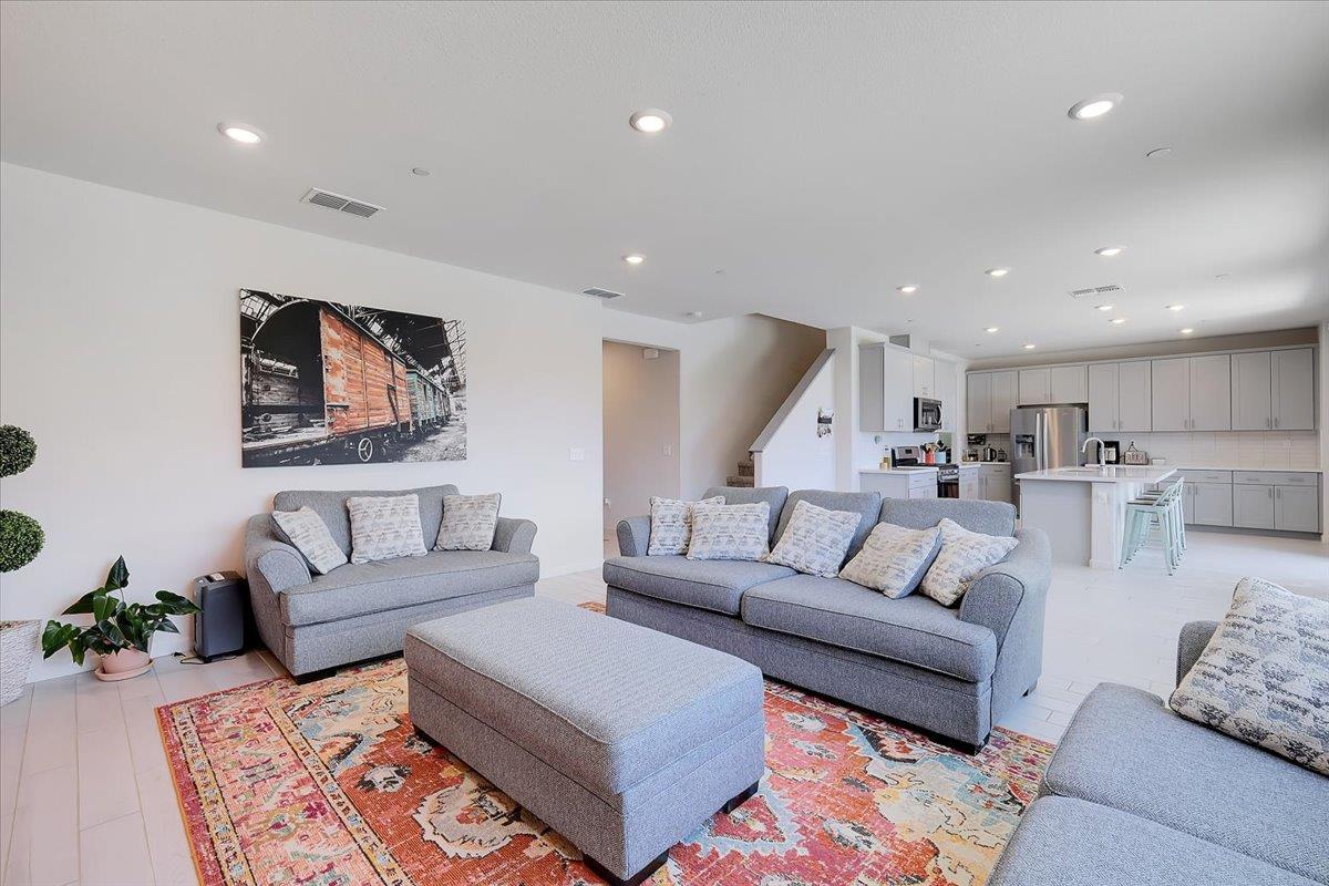 794 Berryessa Way Olivehurst, CA 95961 - Photo 10 of 40 a living room with furniture and wooden floor