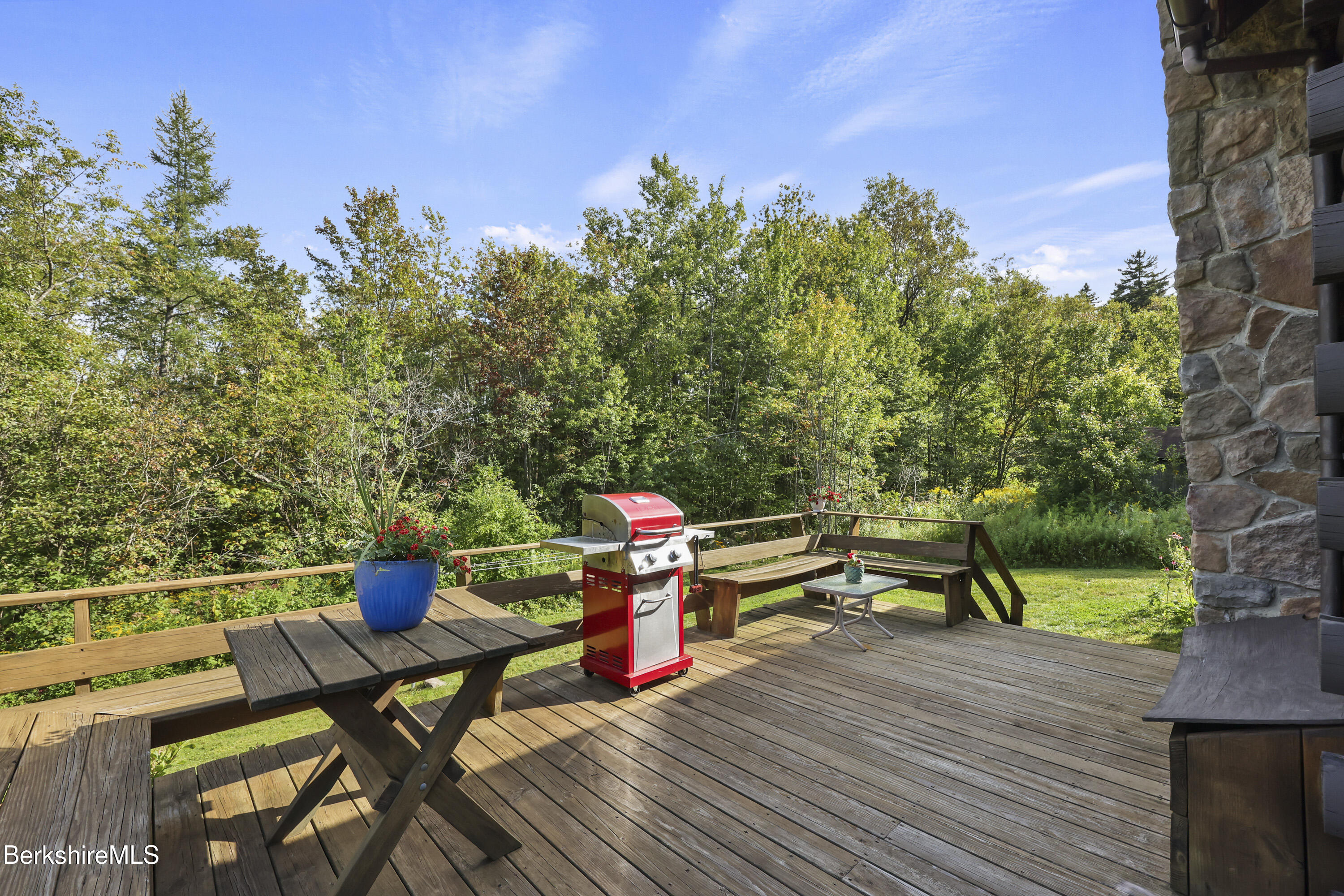 78 East Main Road Peru, MA 01235 - Photo 9 of 56 a view of a chairs and table on the wooden deck