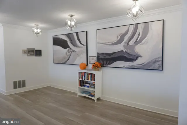 a view of a hallway with stairs